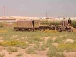 [Photo of a derelict 8F steam locomotive in Baghdad, Iraq, in 2003]