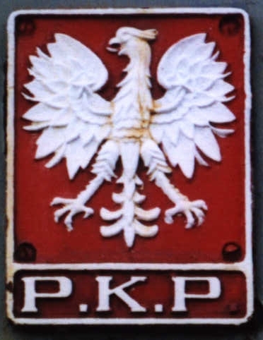 [Cast PKP emblem on a steam locomotive]